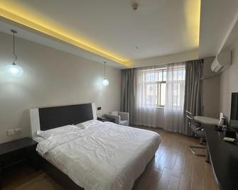 Yunshang Siji Chain Hotel Jinghong Manting Park - Xishuangbanna - Habitación