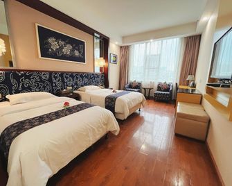 Miaozu Buyi Hotel - Xiangxi - Bedroom