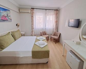 Ilyada Hotel - Bozcaada - Bedroom