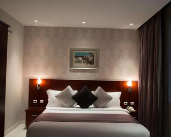 Grand Mayral Hotel - Al Khobar - Slaapkamer