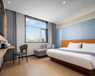 Eurasian Business Hotel Nanyang - Nanyang - Bedroom