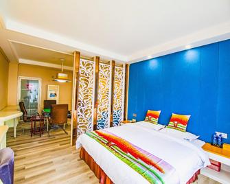 Xinshidai Boutique Hotel (Yichang Shengshi Tianxia) - 宜昌（ギショウ） - 寝室