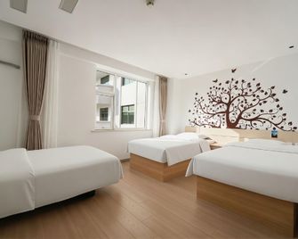 Thank Inn Plus Hotel Weihai Wenhua East Road - Wej-chaj - Ložnice