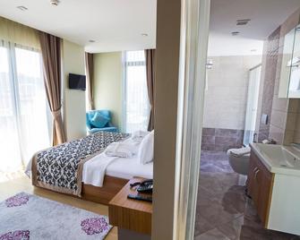 Alesha Suite Hotel & Residence - Yomra - Schlafzimmer