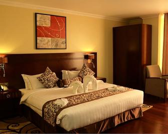 The White Rhino Hotel - Nyeri - Schlafzimmer