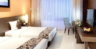 Grand Pacific Hotel - Băng-đung - Phòng ngủ