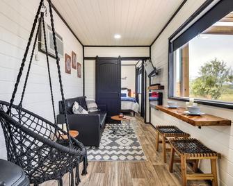 Remote Strawn Container Home With Hot Tub! - Ranger - Living room