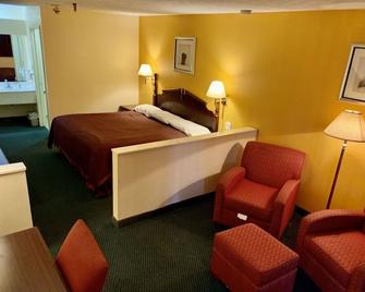 Deluxe Inn & Suites - Greenwood - Camera da letto