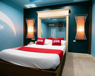 OYO 1160 Top Inn Lam Luk Ka - Ban Talat Rangsit - Habitación