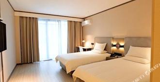 Hanting Hotel (Wuxi Taihu International Technology Park) - Wuxi - Bedroom