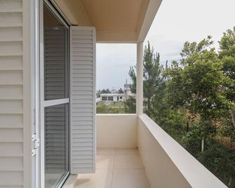 Casa com WiFi a 750 metros da Praia Arroio Seco RS - Torres - Balcony