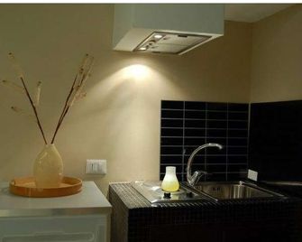 بالاتسو غاليليو بي آند بي - ريدجو كالابريا - غرفة نوم