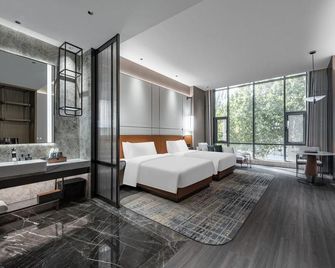 The Puli Oriental Hotel Tianjin - Tianjin - Schlafzimmer