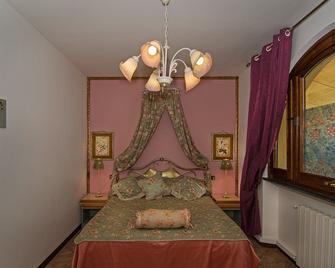 La Casa Gialla - Монтіньозо - Спальня