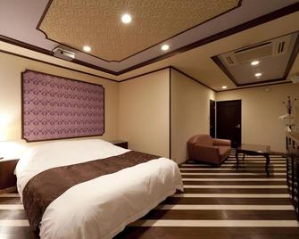 Hotel Fine Garden Matsuzaka III - Matsusaka - Soverom