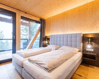 Natural chalet with sauna and hot tub - Turracherhöhe - Bedroom