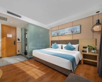 Harbin Central Street Lvyue Boutique Hotel (Saint Sophia Church) - Harbin - Bedroom