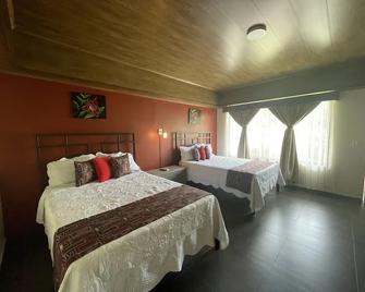 Campos Arenal Hotel - La Fortuna - Schlafzimmer