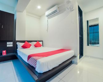 OYO 19315 Samudra Executive - Poona - Slaapkamer