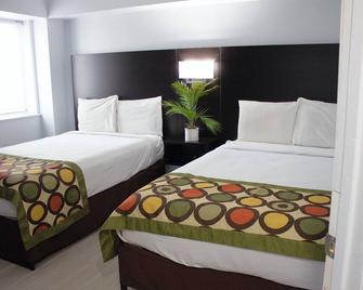 Sun & Sand Resort Oceanfront Suites - Virginia Beach - Schlafzimmer