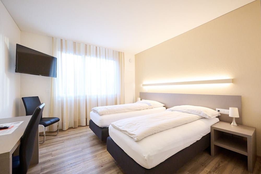 Smart Hotel Kreisel --Self check-In - Lachen - Bedroom