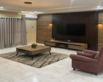 Integral Consults Apartment - Abuja - Living room