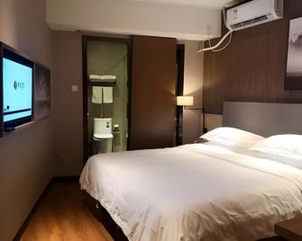 Jtour Inn Changchun Railway Station South Plaza - Changchun - Slaapkamer
