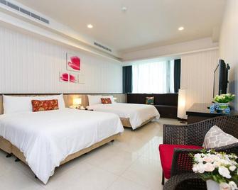 Issmy Hotel Spring Resort - Jiaoxi - Schlafzimmer