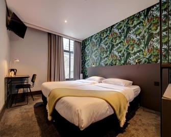 Hotel Sutor - Breda - Habitación