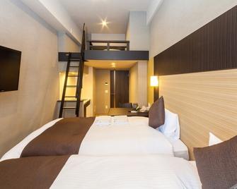 Hotel Suite Hiroshima Yokogawa - Hirošima - Ložnice