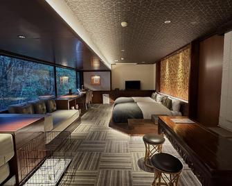 Hotel Shikino Kura - Kawazu - Schlafzimmer