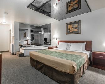 Empire Inn & Suites - Red Deer - Schlafzimmer