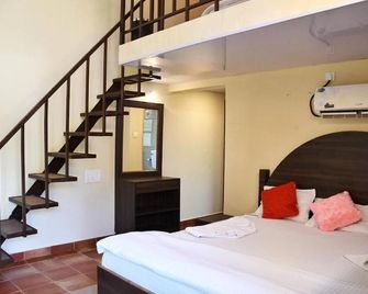 Osaiba Beach Resort - פאנג'י - חדר שינה