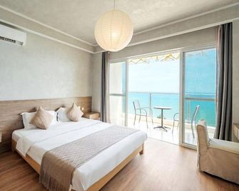 لونجيج ريزورت أبارتمنت - سانيا - غرفة نوم