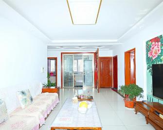 Blessed Family Seaview Apartment 1601 - Qingdao - Wohnzimmer