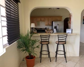 Spacious 3-Bed 2-Bath Fully Air Conditioned Home - Kingshill - Kitchen