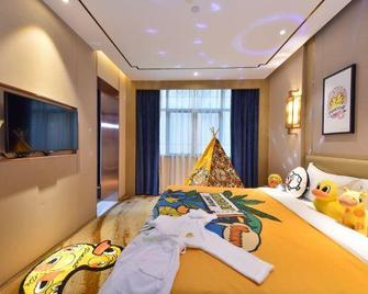 Wanyi Qingqin Hotel - Hengyang - Schlafzimmer