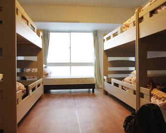 Nagoya Travellers Hostel - Nagoya - Bedroom