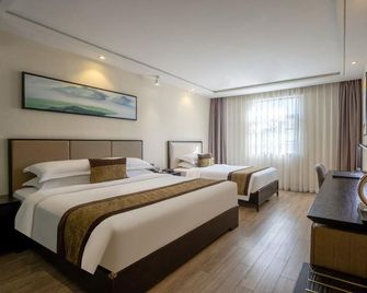 Phoenix Valley Holiday Hotel Zhuhai (Gongbei Port Zhuhai Station Store) - Zhuhai - Habitación