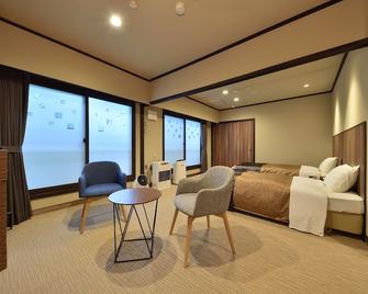 Yumoto Shirogane-Onsen Hotel - Biei - Bedroom
