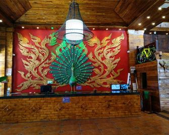 Xishuangbanna Peacock Princess Hotel - Xishuangbanna - Front desk