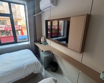 Jiayi Business Express Hotel - Yanbian - Bedroom