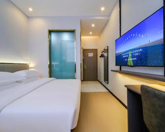7Days Sunshine Zhoukou Qiyi Road City Hall - Zhoukou - Bedroom