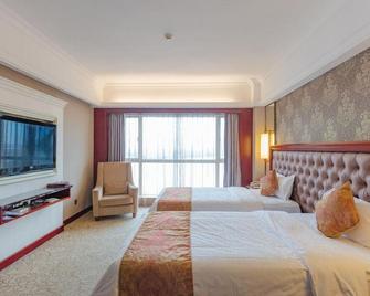 Sanbu Holiday Hotel - Jiangmen - Slaapkamer