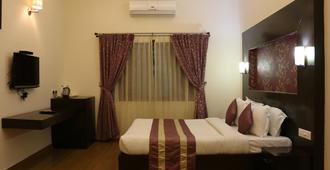 Oriole Resorts - Mysore - Makuuhuone