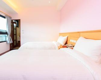 Houshan Baodian Guan zìzai - Dongshan Township - Camera da letto