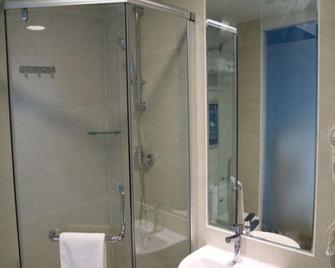 7 Days Inn Xishuangbanna Gao Zhuang Xi Shuang Jing Branch - Xishuangbanna - Badkamer