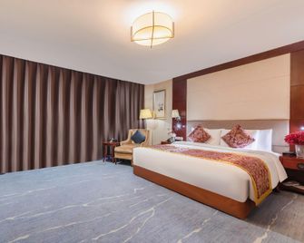 Zhengzhou Wuzhou Hotel - Zhengzhou - Bedroom