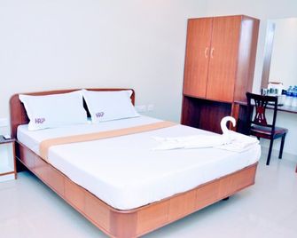 Hotel Raams Park - Tiruchirappalli - Slaapkamer