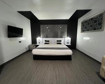 Jl Star Hotel - Makassar - Slaapkamer